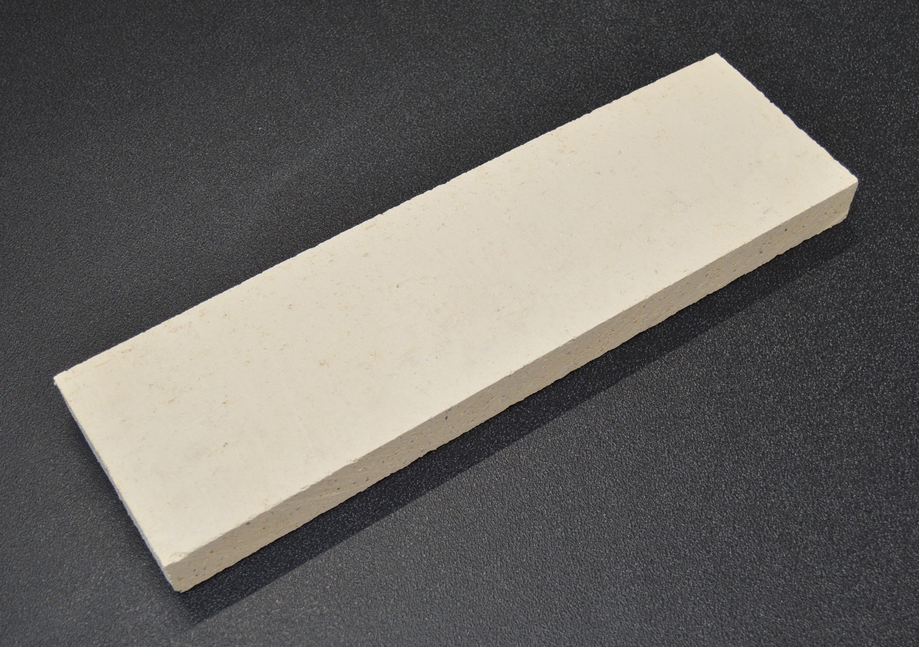 Novaline Stellino Rückwandstein links Brennraumstein